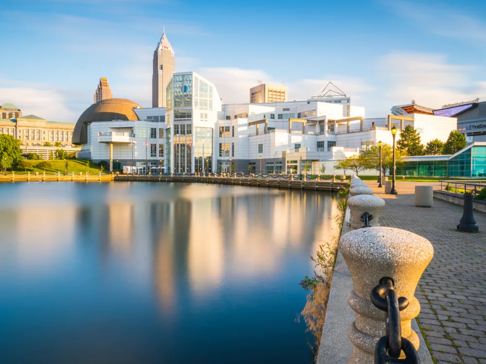 One of the best science museums in America, The Great Lakes Science Center in Cleveland, Ohio reflected on the almost-still waters of Lake Erie during a bright summer afternoon