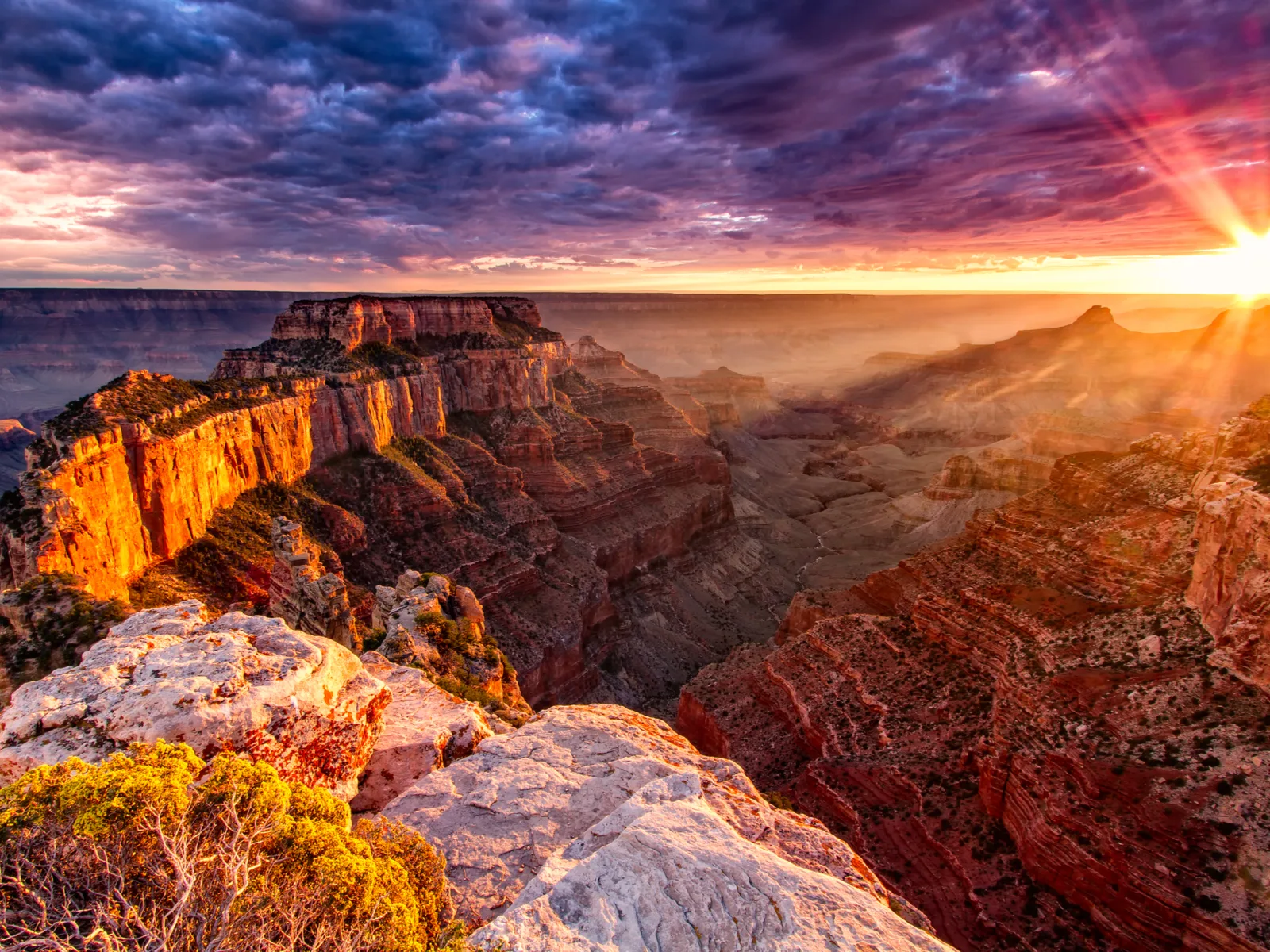 Gorgeous view of a sunset over the North Rim during the best time to visit Grand Canyon National Park