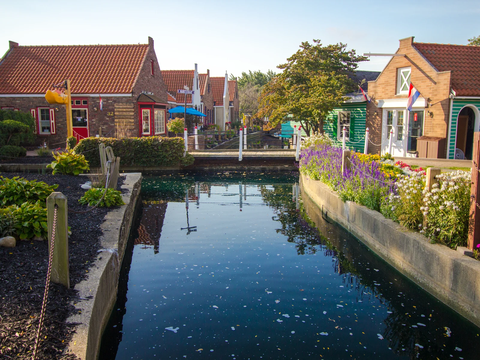 Canal in the middle of Holland, one of the best places to visit in Michigan, with tulips on either side