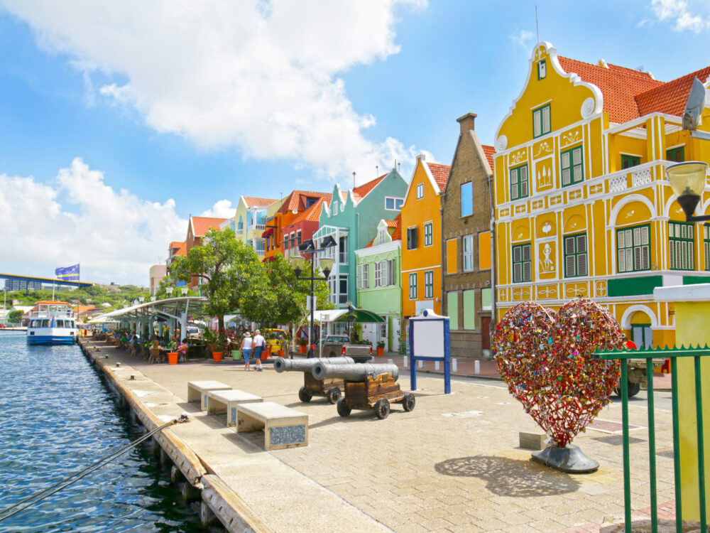 Dock view of Willemstad, Curacao, one of the best places to visit in the Caribbean, pictured on a summer day
