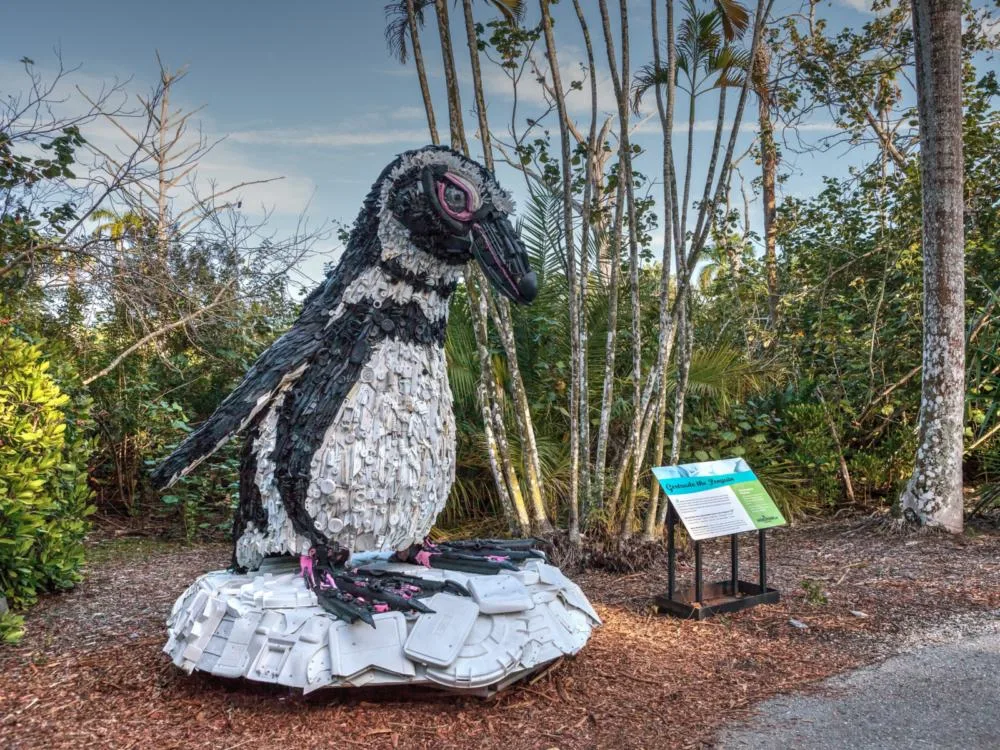 Gertrude the pengiun statue found at one of South Florida's things to do, the Naples Zoo