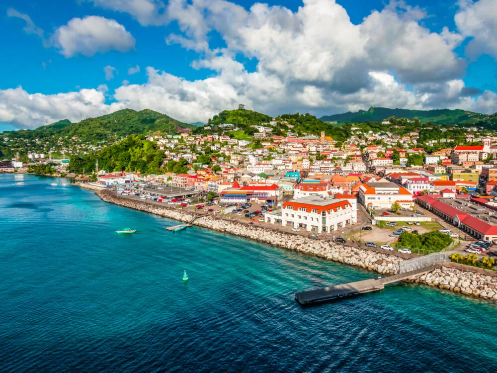 Boats docked off the rocky coastline of one of the safest islands in the Caribbean, St George's, Grenada