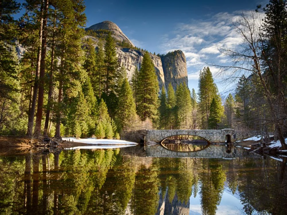 During the best time to visit Yosemite, the Stoneman Bridge pictured in morning light