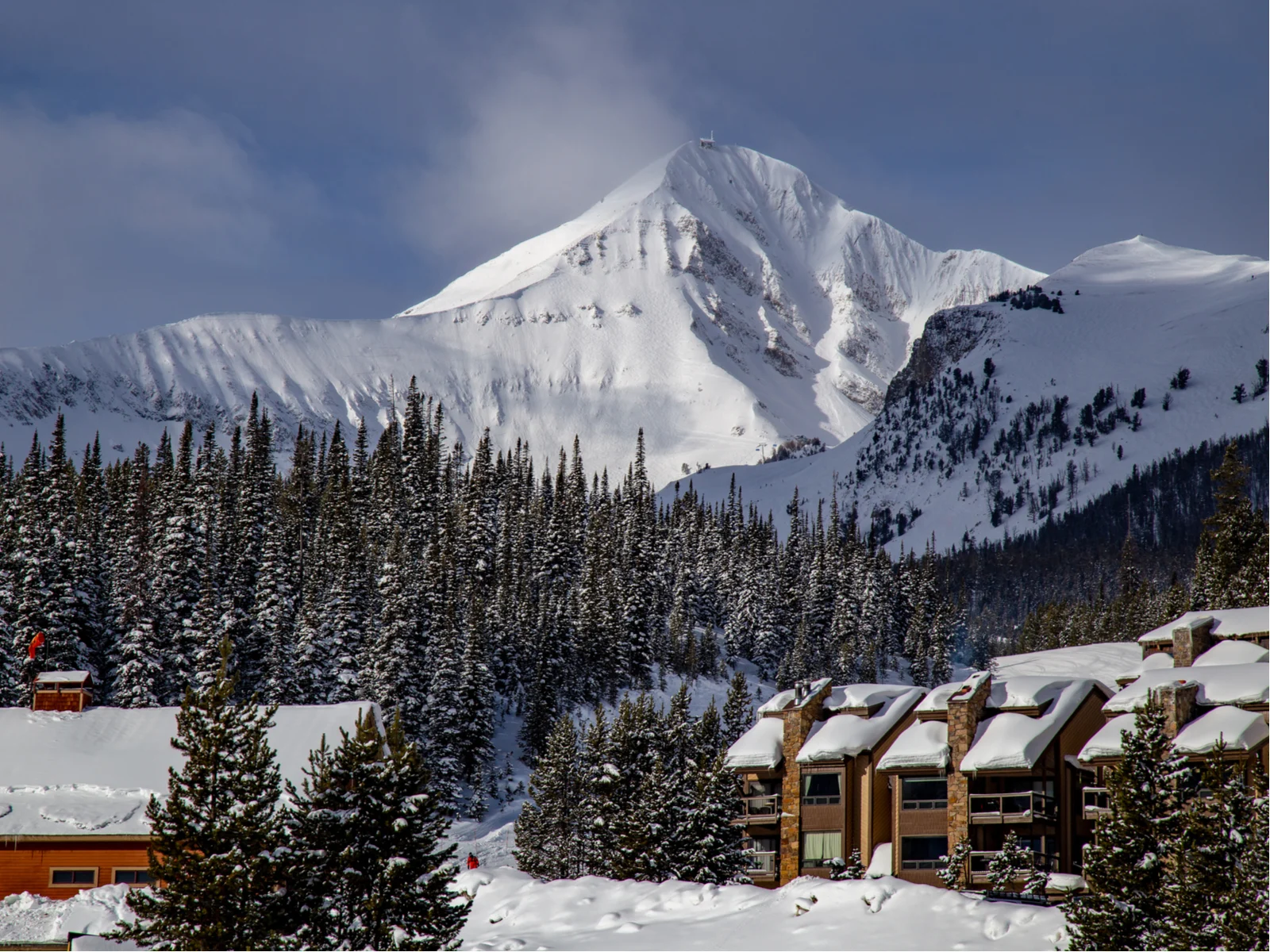 Gorgeous winter view of Big Sky Montana ski lodge, one of the best things to do in Montana