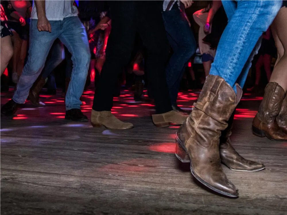 People line dancing at the White Horse, one of the best things to do in Austin Texas