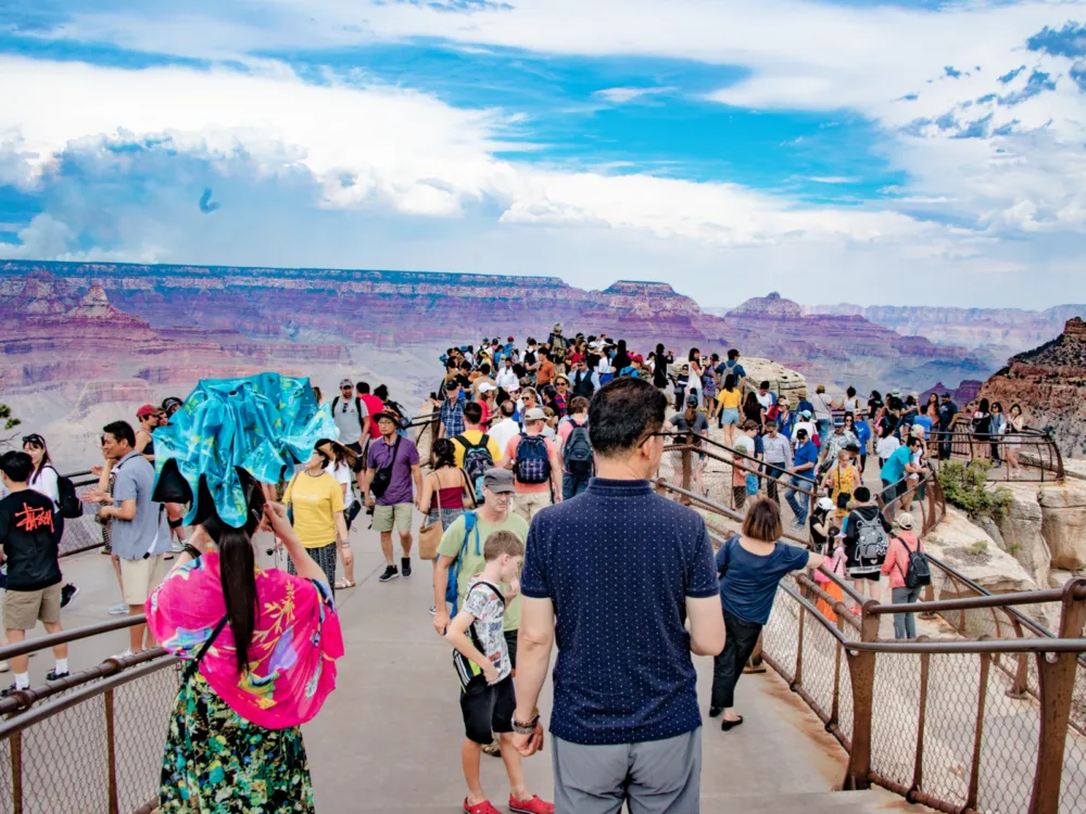 Image of a large crowd pictured during the worst time to visit Grand Canyon National Park