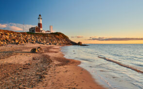 Image of a lighthouse at Montauk beach, one of the best places to stay in The Hamptons