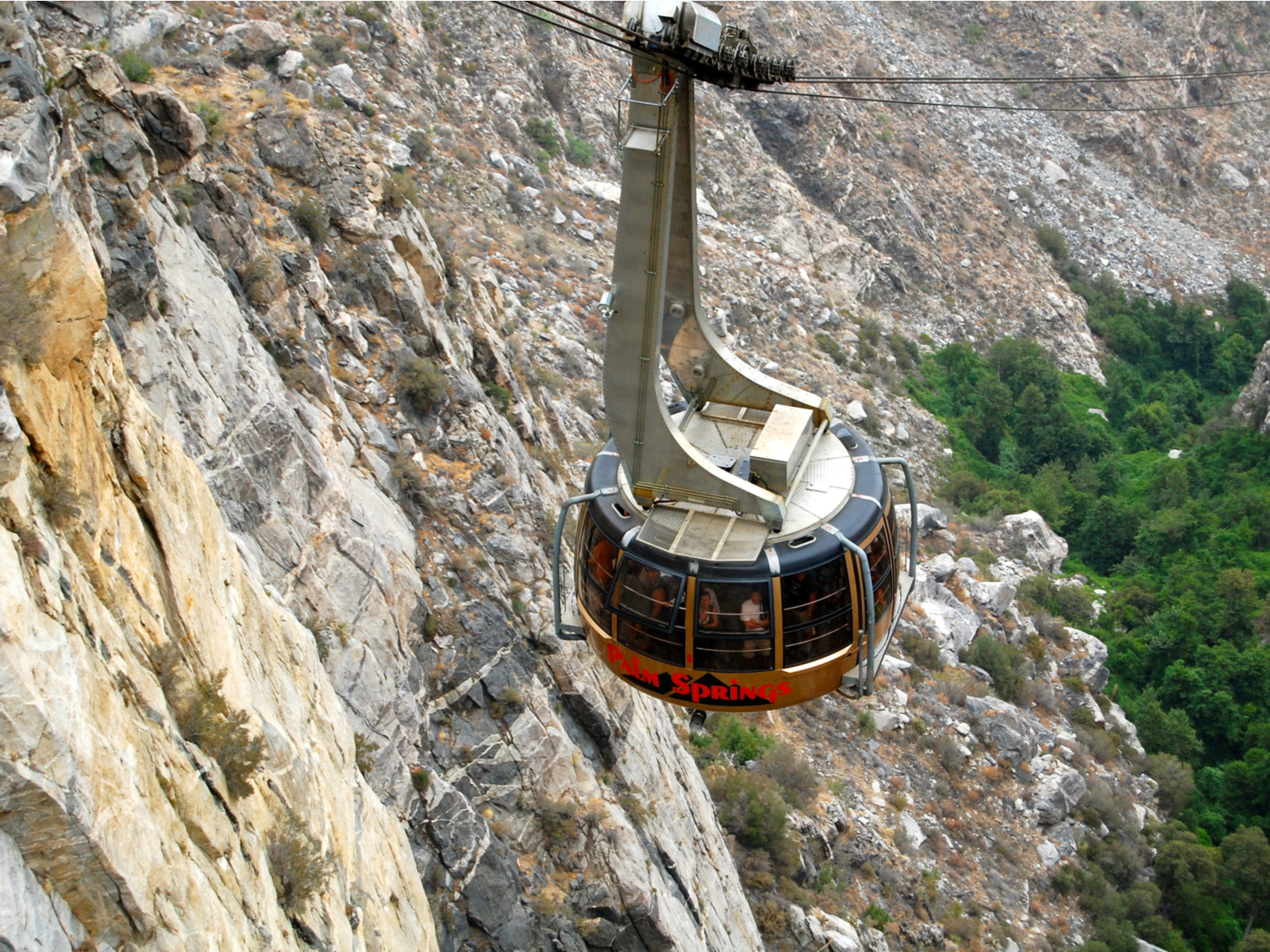 Palm Springs aerial tramway going over a hill