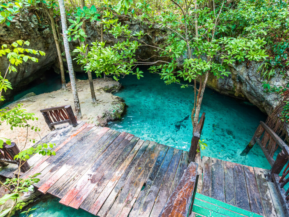 Neat view of the Gran Cenote as seen from the steps for a piece on the best places to stay in Tulum