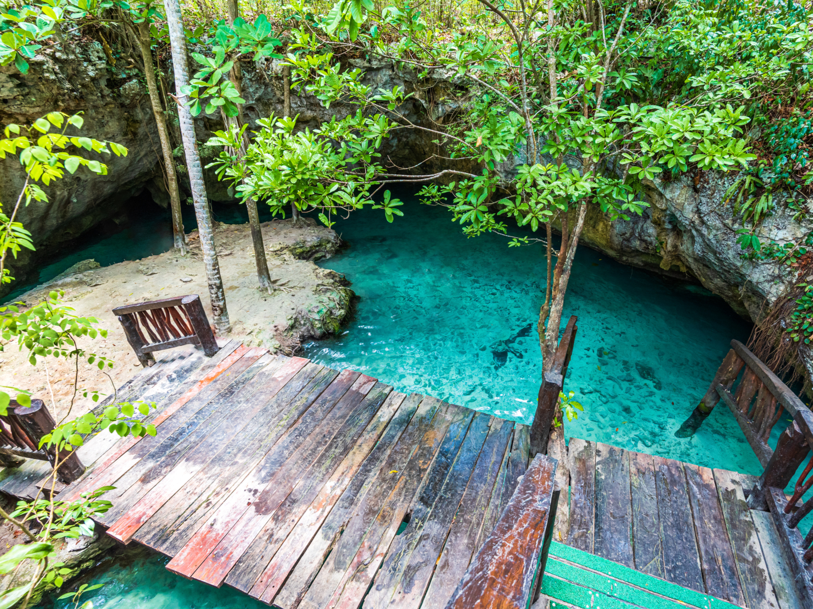Neat view of the Gran Cenote as seen from the steps for a piece on the best places to stay in Tulum