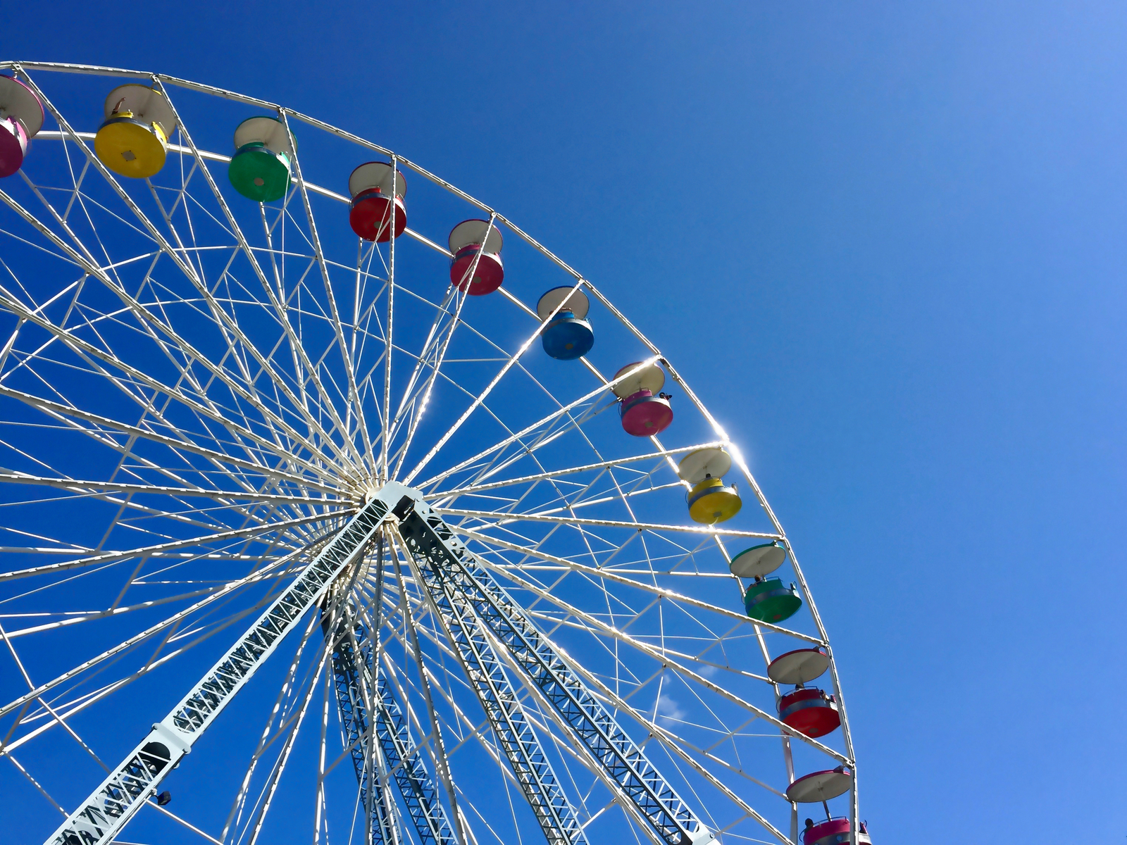 Pictured in worm's-eye view as a piece on the best things to do in Pennsylvania, the gigantic Ferris Wheel at Knoebels Amusement Resort on a clear day