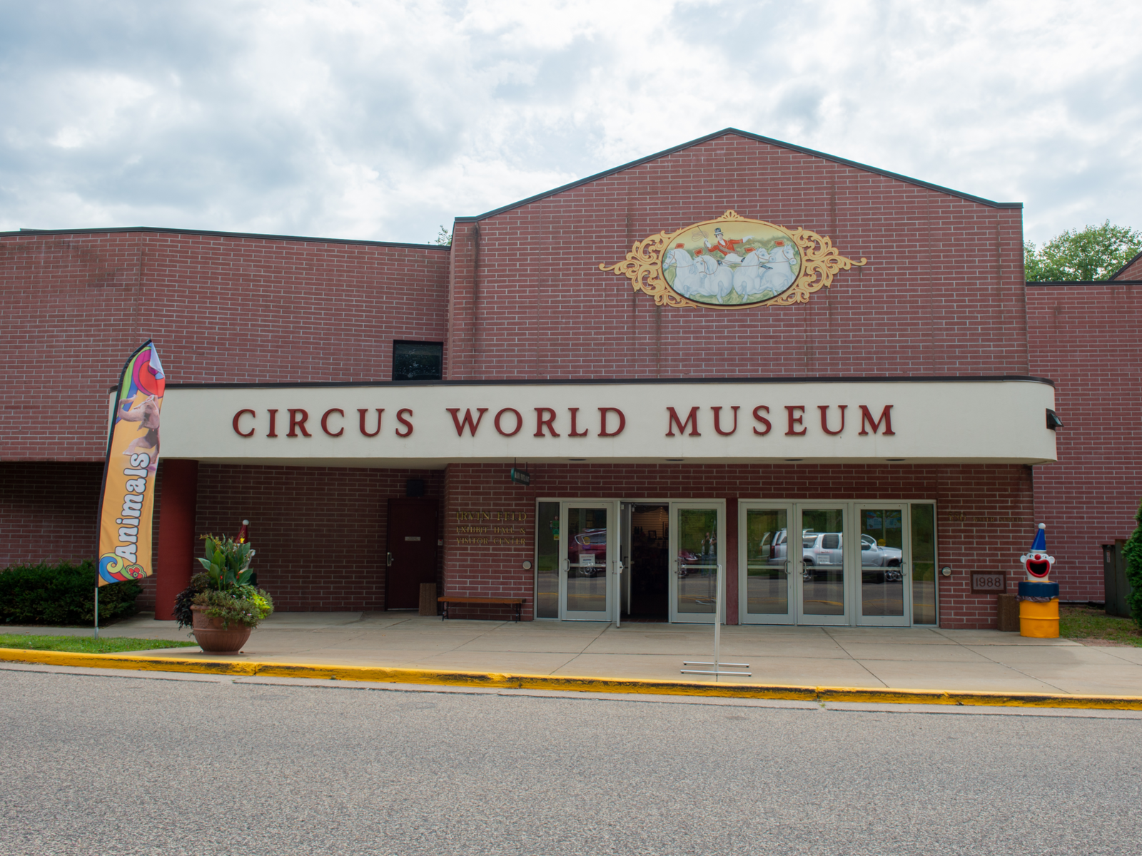 The entrance of the old Circus World Museum with brick walls and glass doors is one of the best Wisconsin tourist attractions