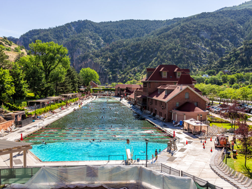 Exterior photo of the Glenwood pool, one of the best hot springs in Colorado, in the Summer