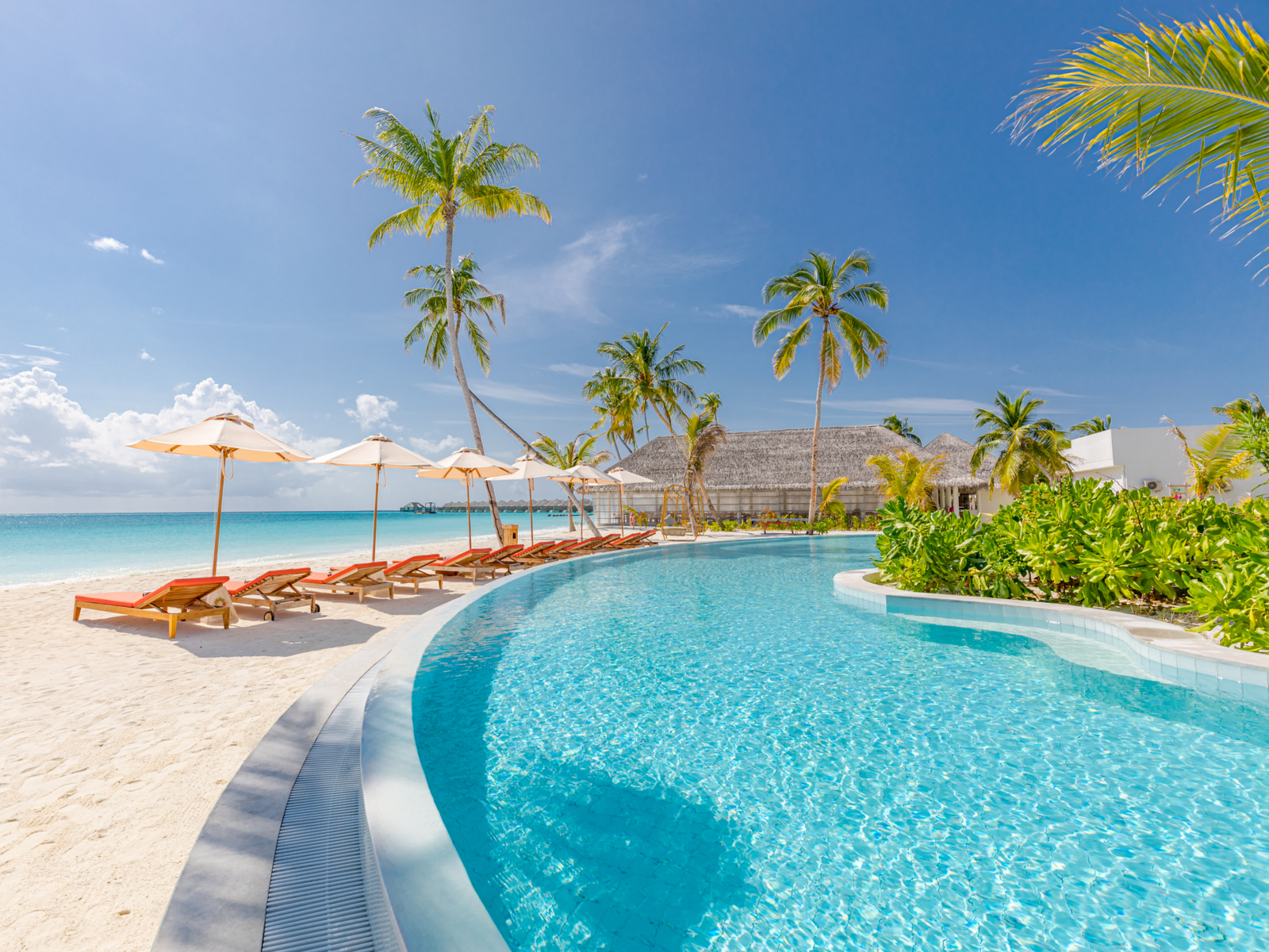 One of the best all-inclusive resorts in the Caribbean seen from the pool deck looking into the ocean