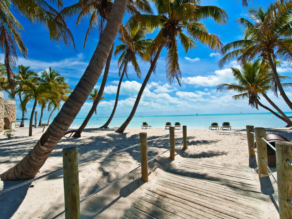 Gorgeous view of a footbridge to the beach from one of the best hotels in Key West Florida