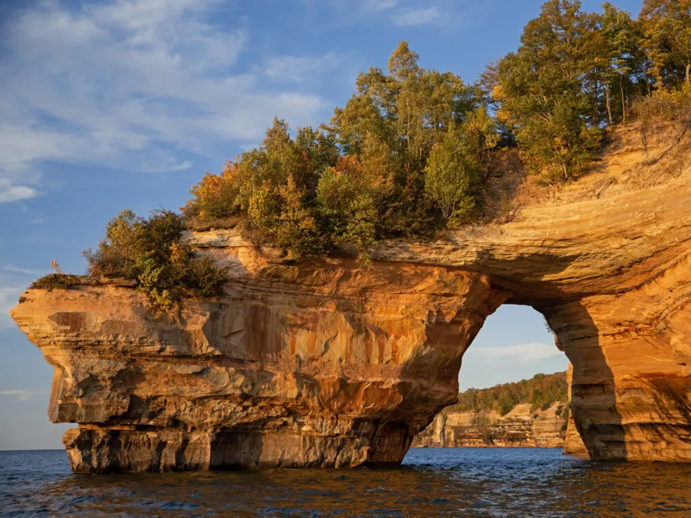 Pictured Rocks National Lakeshore, one of our favorite places to visit in Michigan, pictured from a boat