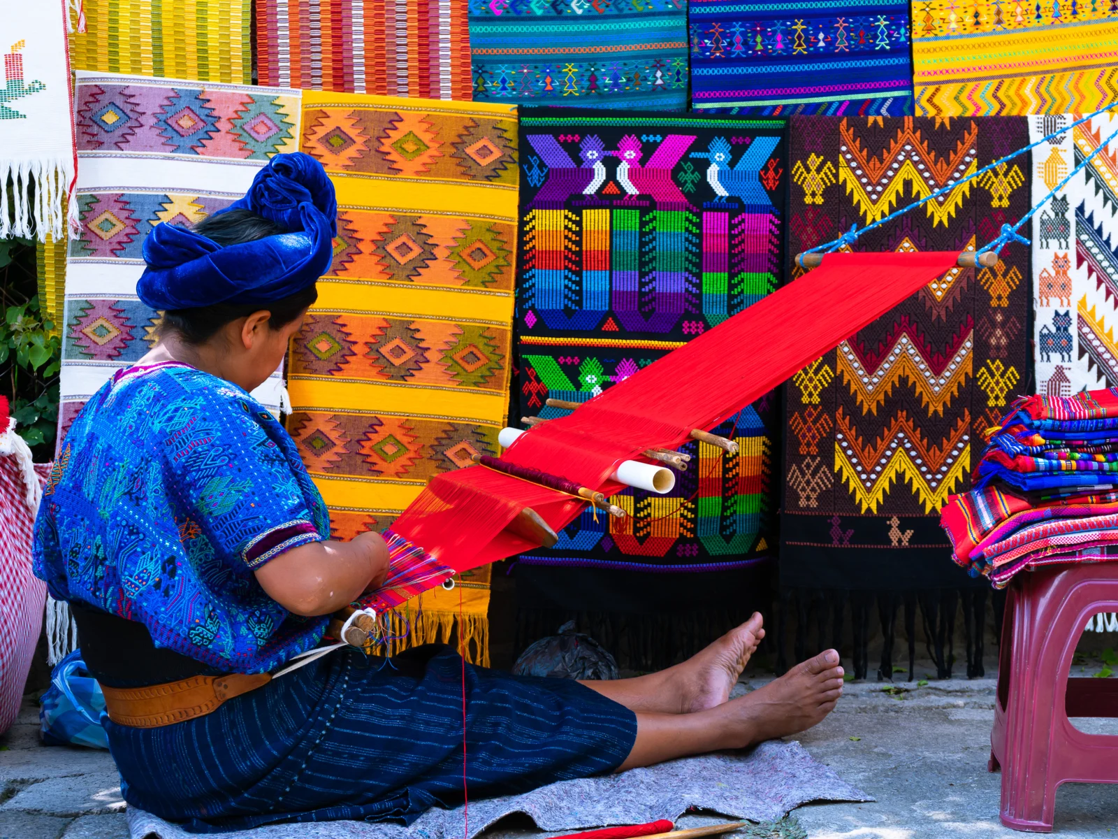 Mayan woman in San Antonio weaving a blanket on First Friday