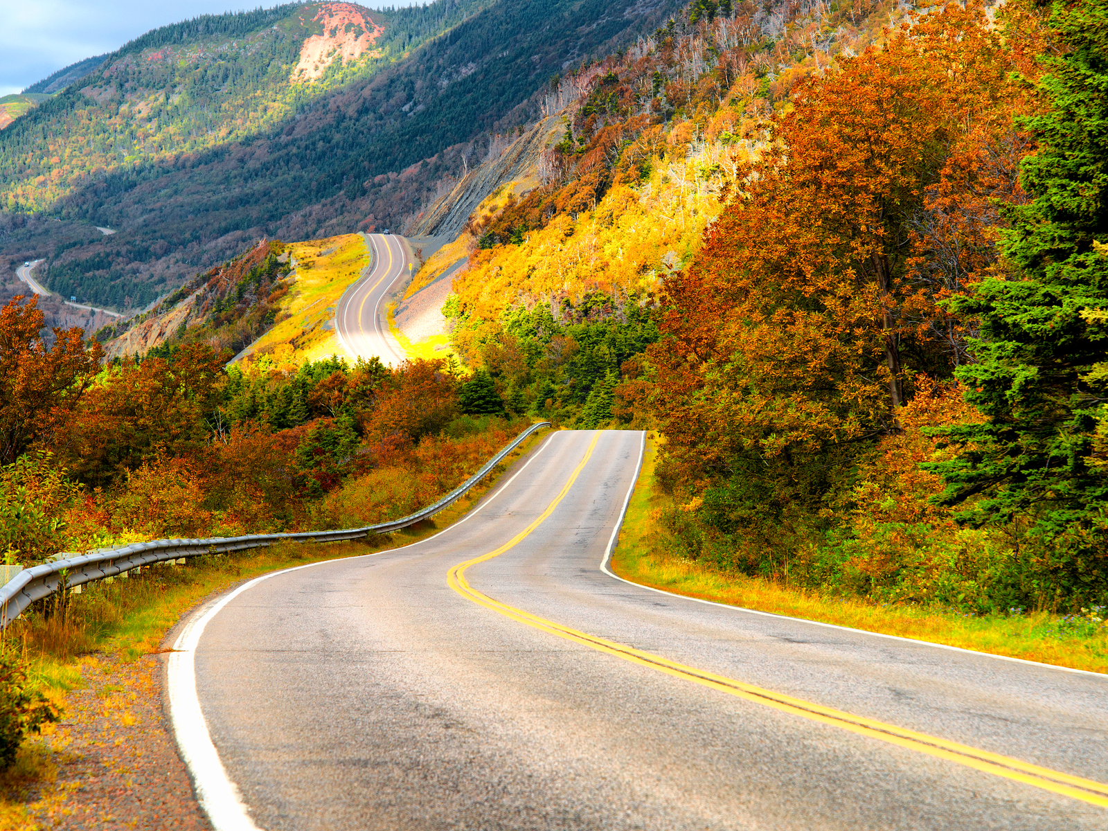 The winding roads of Cabot Trail on an Autumn Season in Breton Island, Nova Scotia, one of the best places to visit in Canada