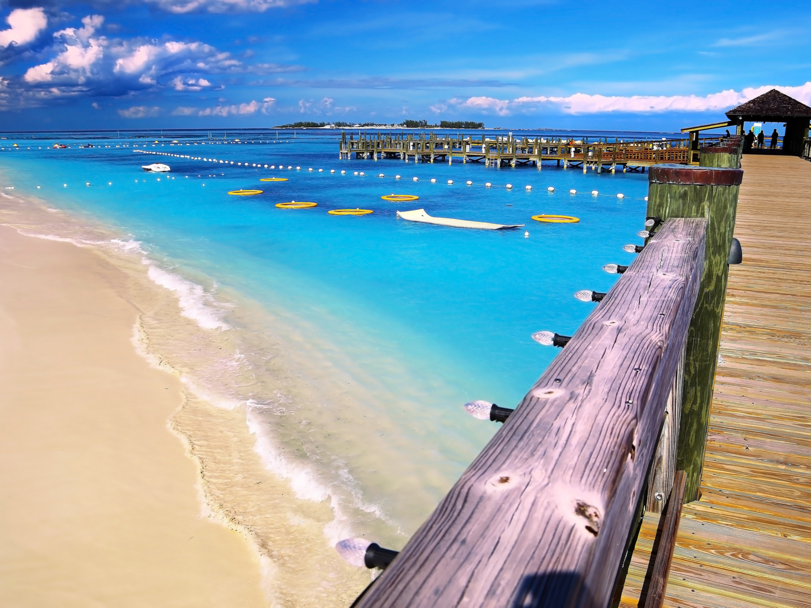 Gorgeous view of Paradise Cable Beach's pier for a piece on where to stay in the Bahamas