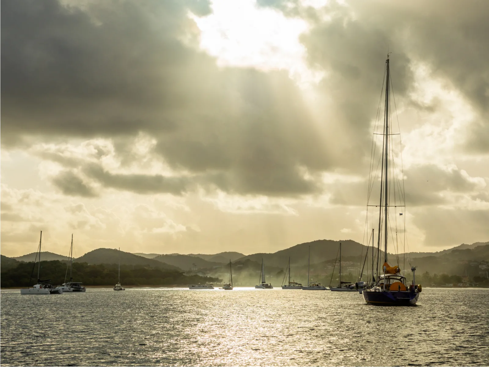 Boats on a sunset cruise, one of the best things to do in Saint Lucia