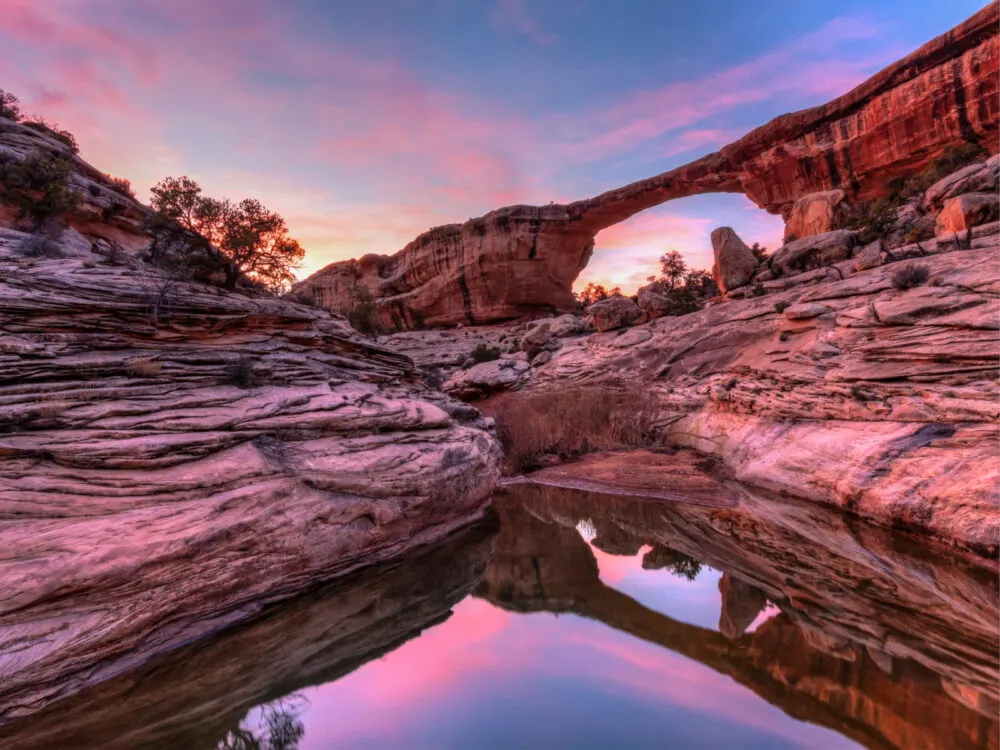 Natural Bridges National Monument, a top pick for the best places to visit in Utah, seen in at dusk