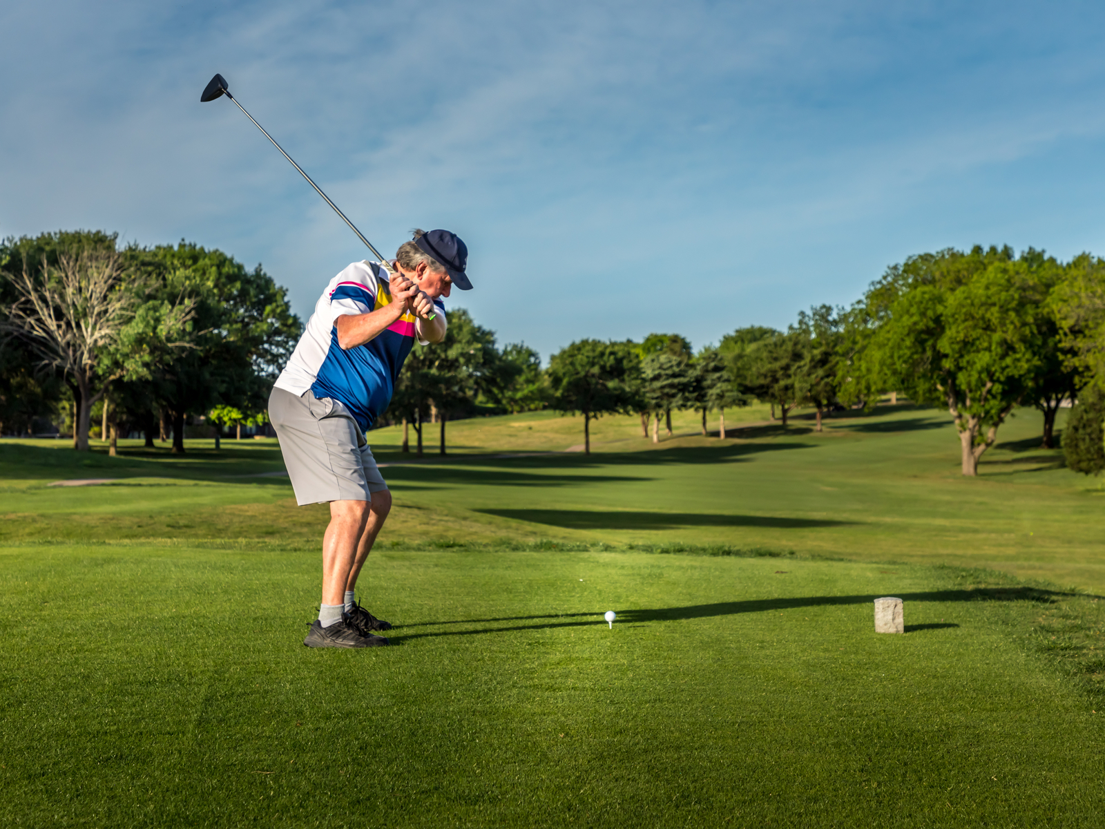 Guy golfing at the Quarry, one of the best things to do in San Antonio