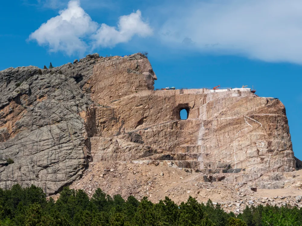 On going construction at Crazy Horse Memorial where a whole stone mountain is sculpted into a monument of the famous Native American Chief Crazy Horse which will become one of the best South Dakota tourist attractions