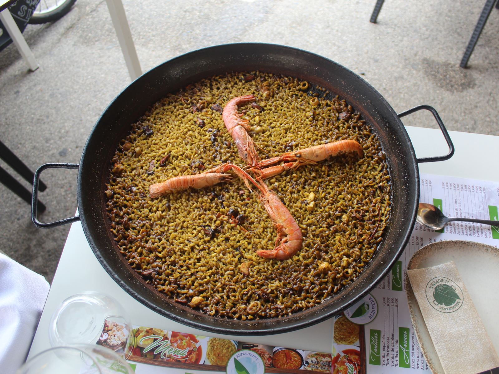 Mexican style Seafood Paella served on a table at El Palmar, one of the best restaurants in Cancun