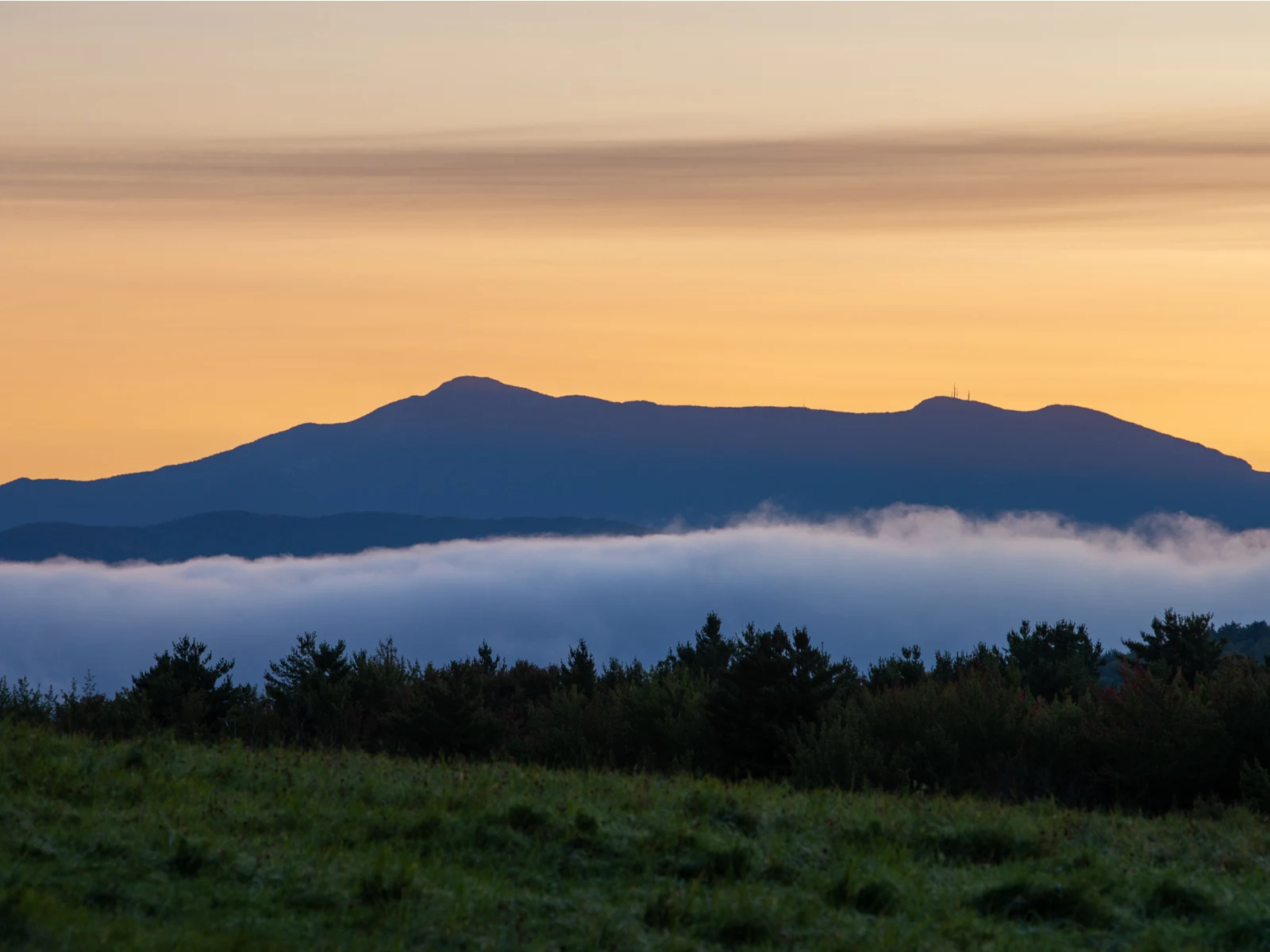 Pretty view of one of the best things to do in Vermont, Mount Mansfield, as seen in the Summer