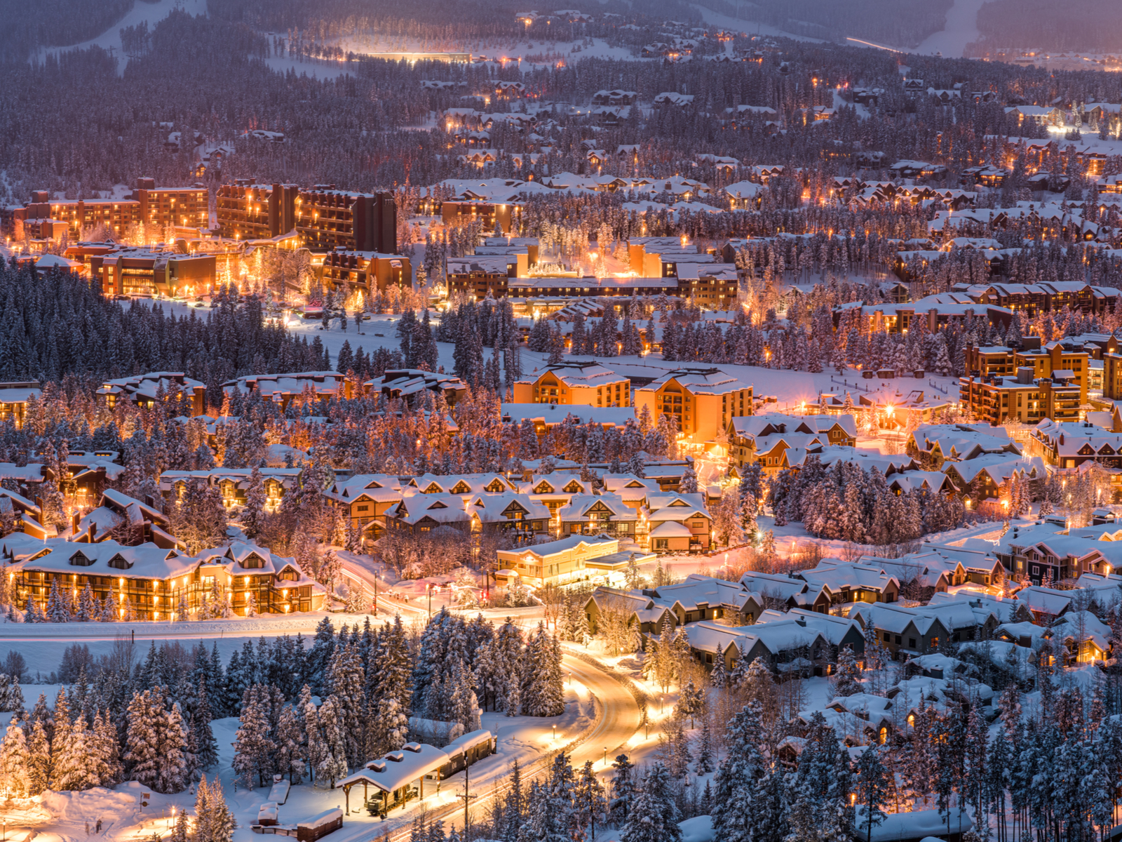Illuminated town of Breckenridge during the cold winter night, one of the best ski resorts near Denver with the most affordable tickets and lovely lodging