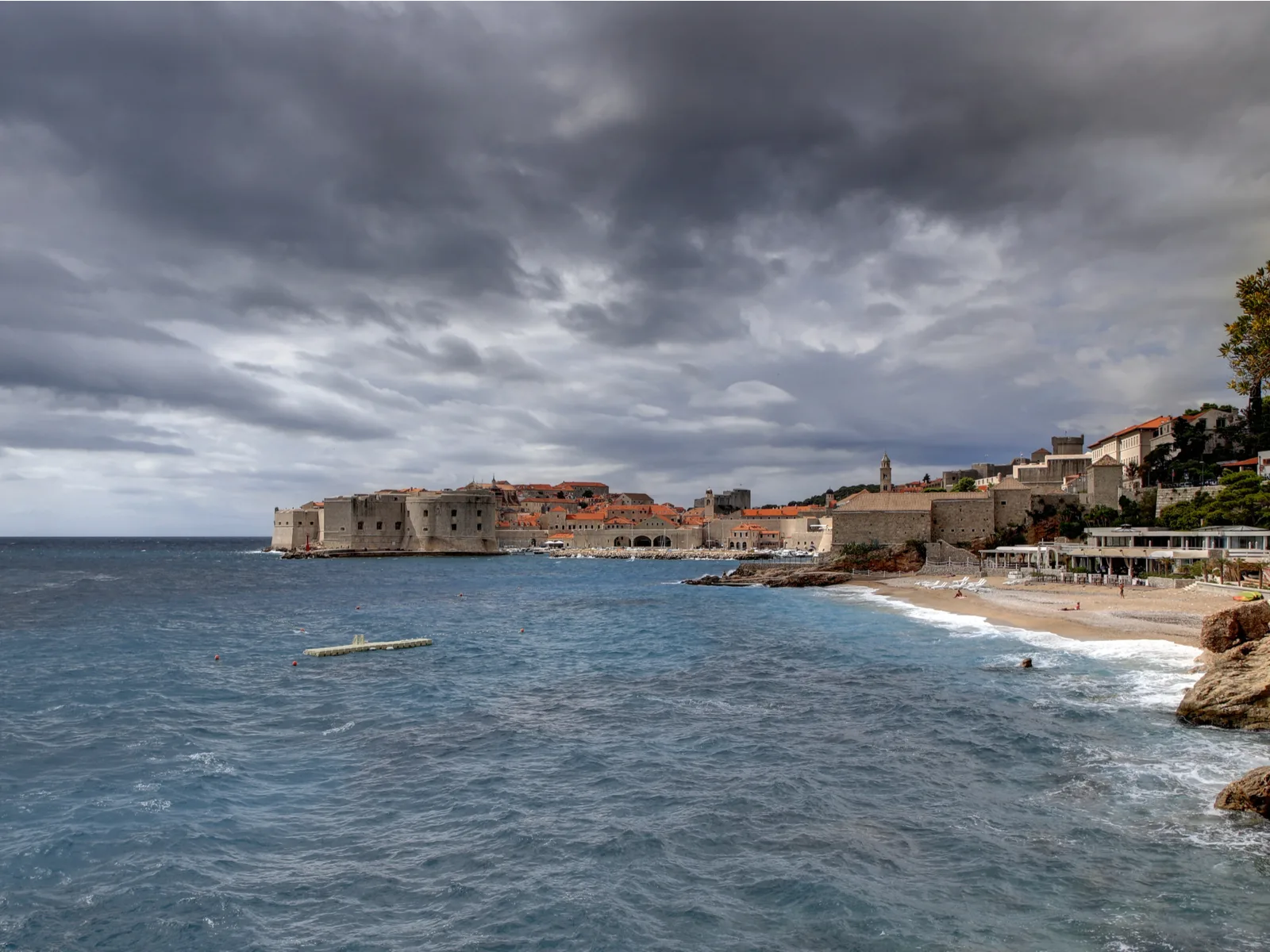 Cloudy sky with rain over the ocean during the worst time to visit Croatia