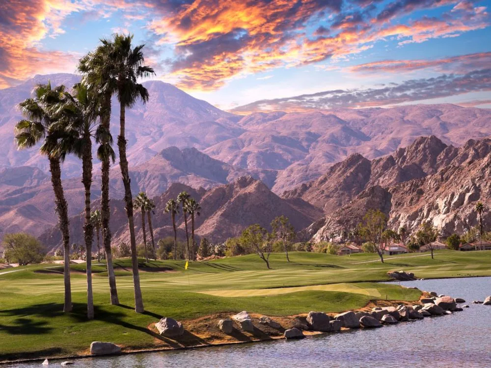 Gorgeous Palm Springs sunrise over a golf course during the best time to visit California