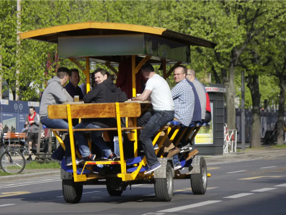 Eight folks on a beer bike for a piece on the best things to do in Dallas