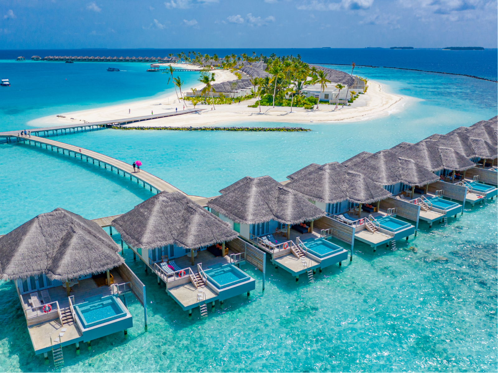 Aerial view of over-water huts in the Maldives, one of the world's best island vacations