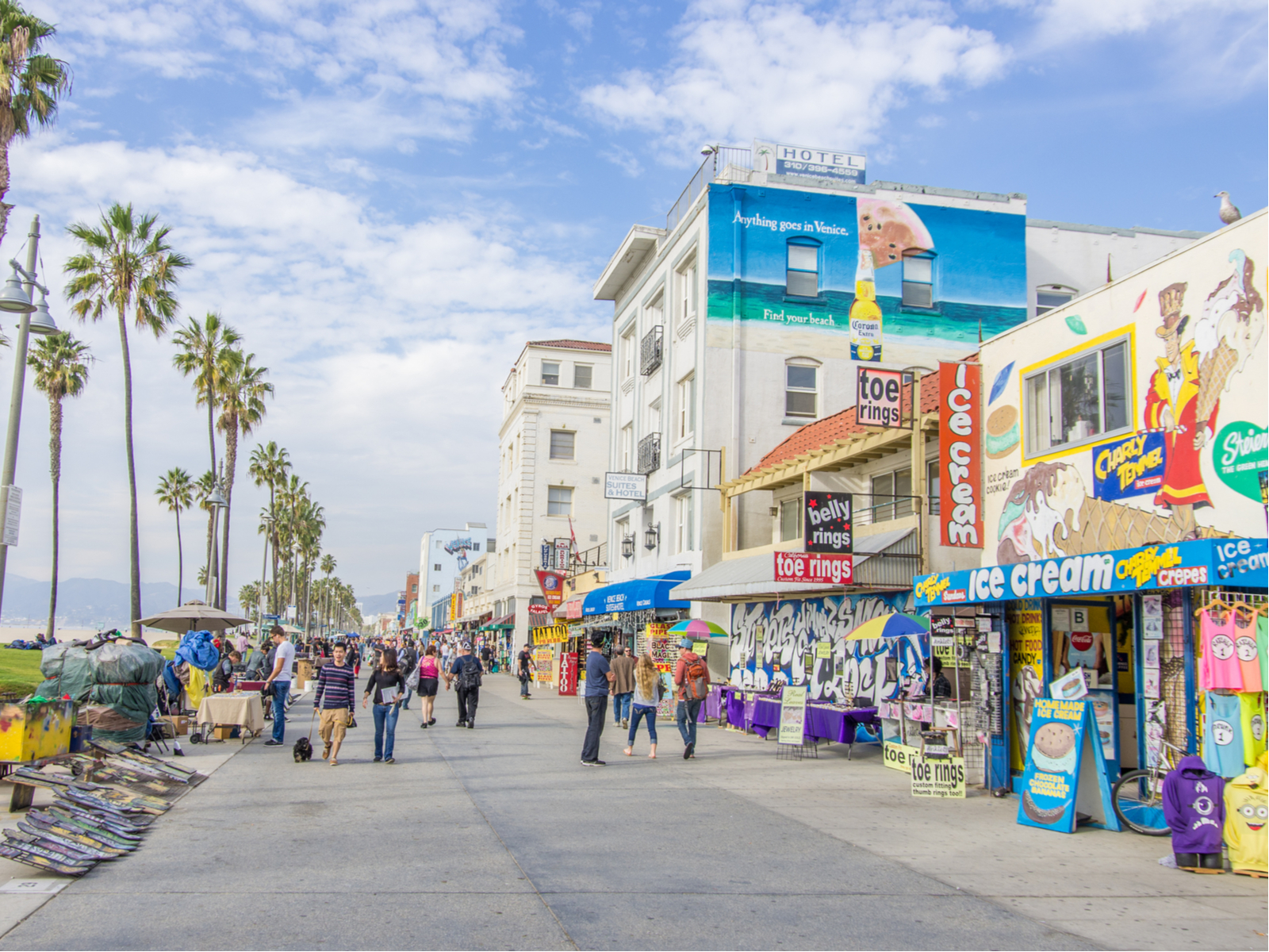 Venice beach boardwalk, one of the best things to do in Los Angeles, pictured on a clear and sunny day