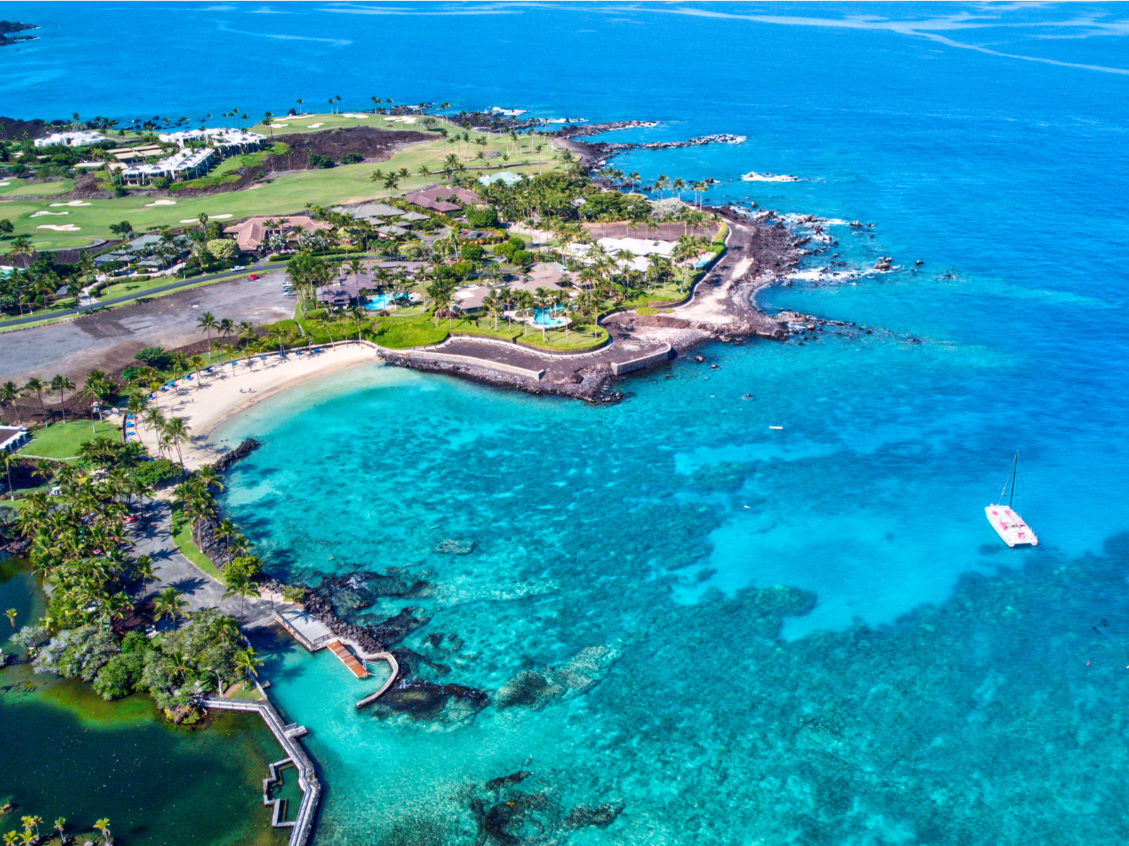 Beautiful aerial shot of the Maunalani Beach Club during the best time to visit the Big Island