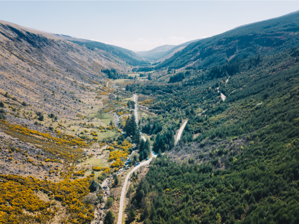 Aerial view on trail in Glenmalure Valley leading to the tallest peak of Lugnaquilla, one of the best hikes in Ireland
