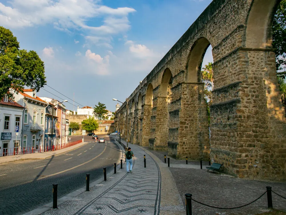 Aqueduct above the walkway in Coimbra, one of Portugal's best places to visit