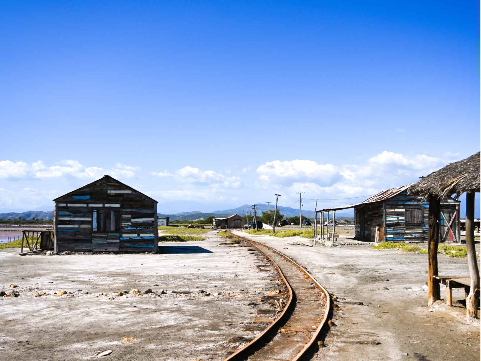 An amazing view of railroad tracks in the salt mines in Salinas, one of the best things to do in the Dominican Republic