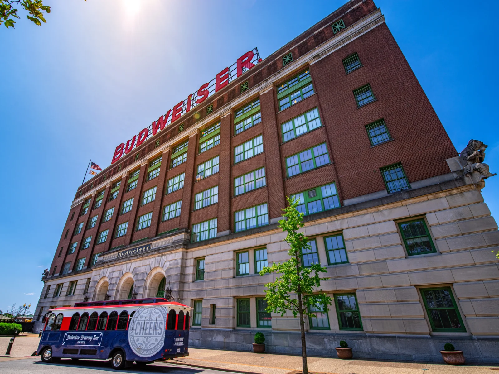 A tour bus parked in front of Budweiser Bottling Facility, one of the oldest breweries and one of the best things to do in St. Louis