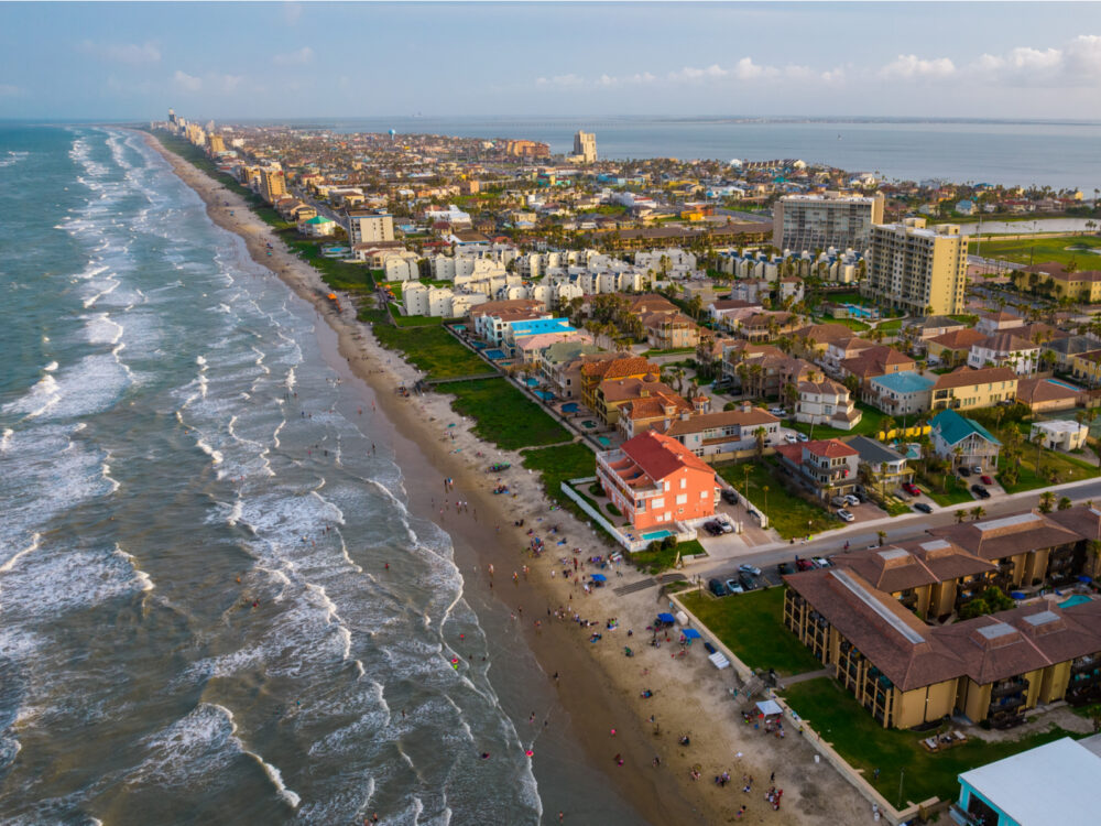 Beautiful aerial shot of Padre Island, one of the best things to do in Texas, on a windy day