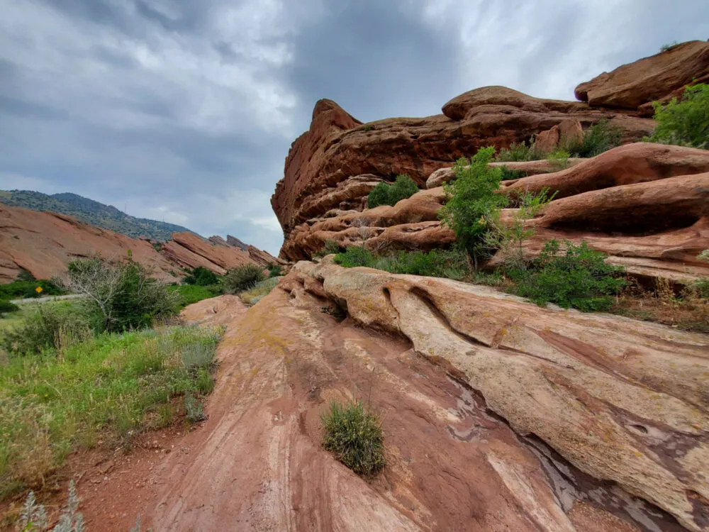 Huge rock formation at the Red Rocks Trading Post Trail, shot on an overcast day as a piece on the best hikes near Denver