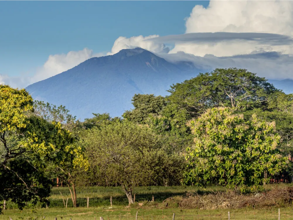 Rincón de la Vieja volcano seen from the countryside for a piece on the best places to visit in Costa Rica