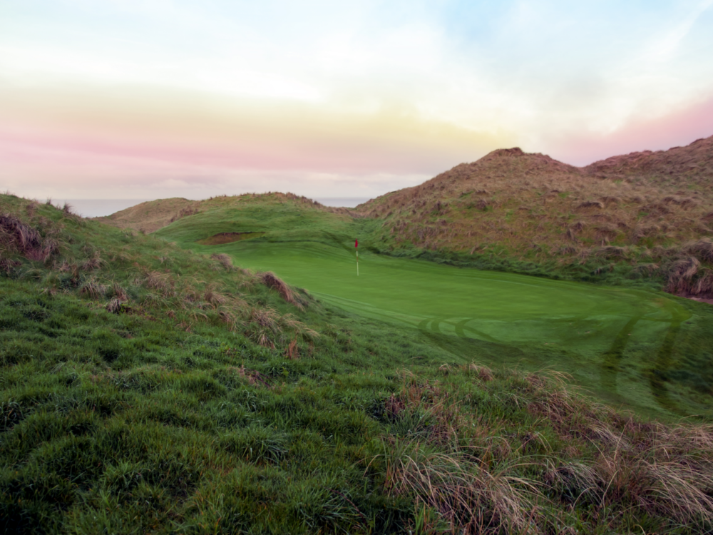 uneven green grass and hills at Ballybunion Links Golf Course, named as one of the best golf courses in Ireland