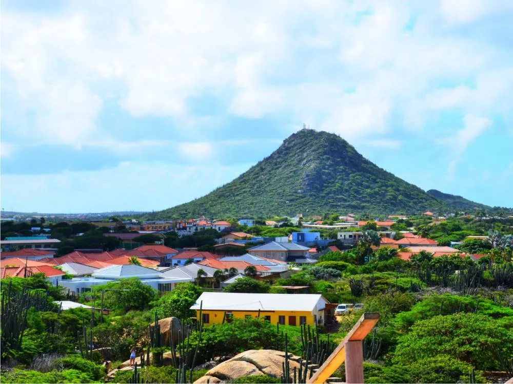 Distant shot of one of the best things to see in Aruba, Hooiberg