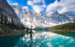 Picturesque view of the mountains by Moraine Lake, one of the best places to visit in Canada