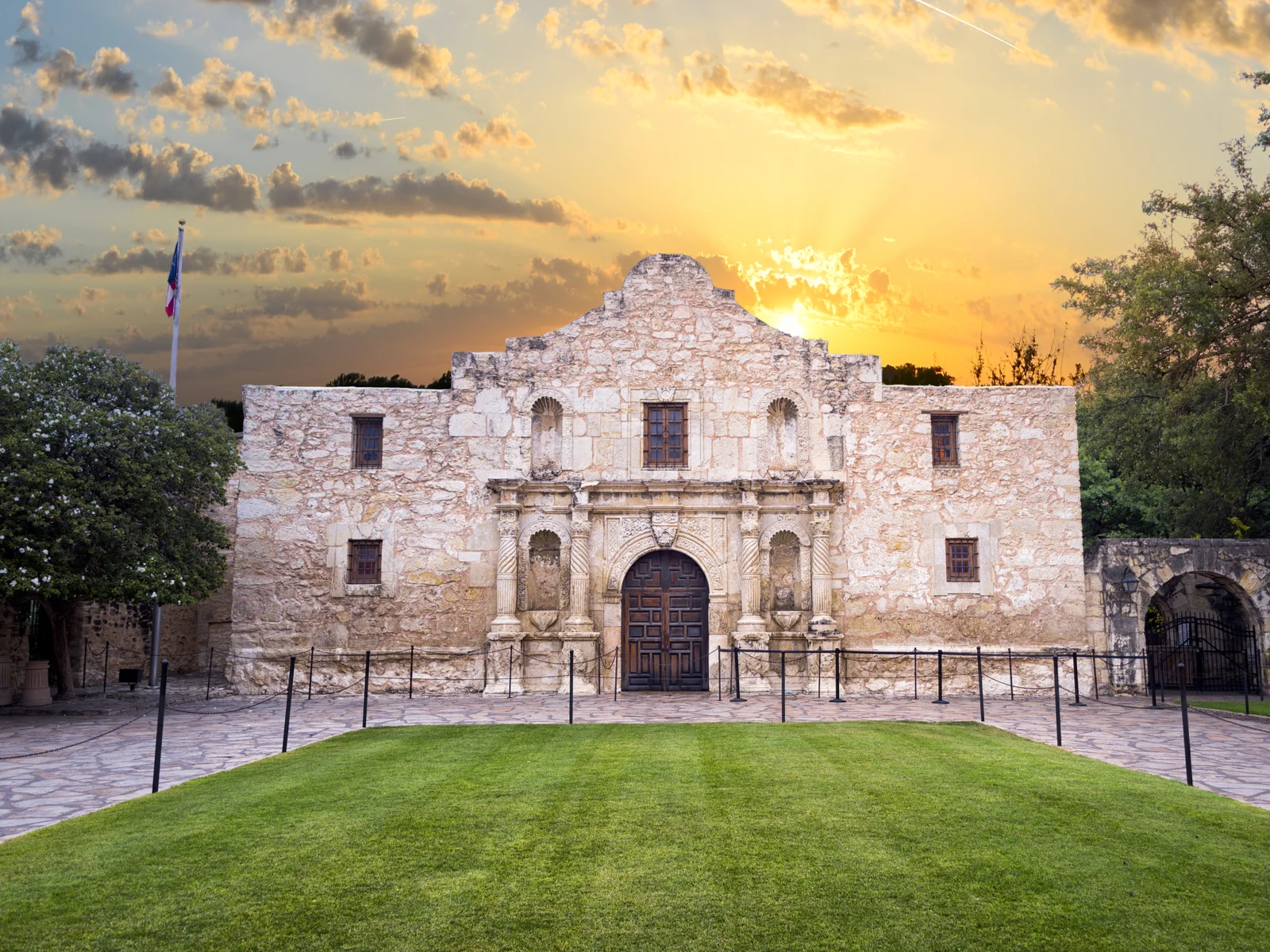 The Alamo, one of the absolute best things to do in San Antonio, pictured at dusk