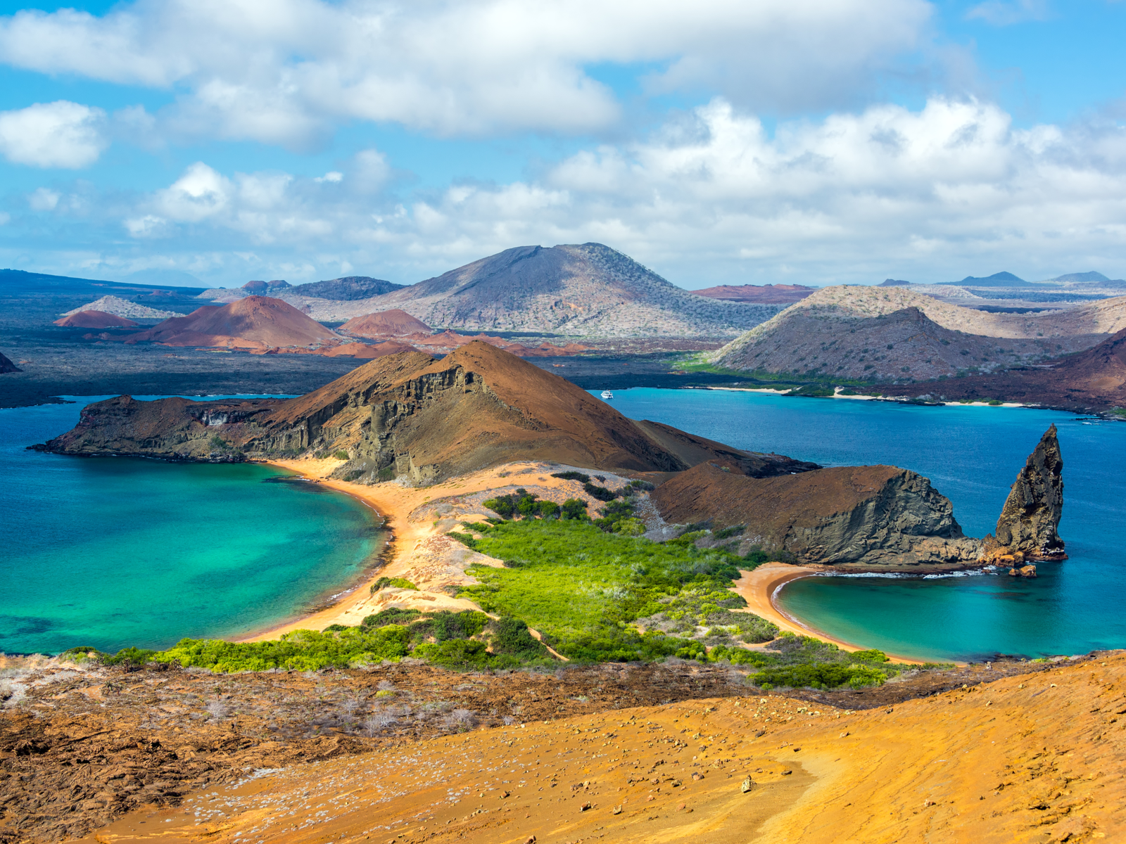 View of two beaches on Bartolome Island, one of the best island vacations in the world