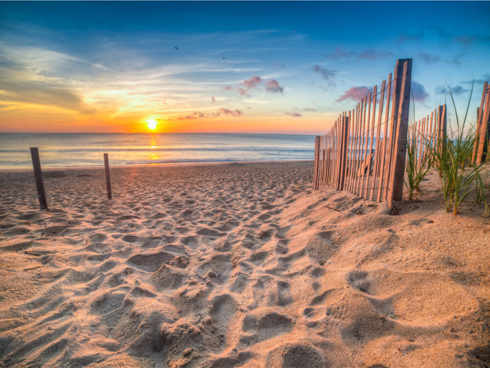 A beach entry in The Outer banks, one of the best places to visit in North Carolina, pictured at dawn