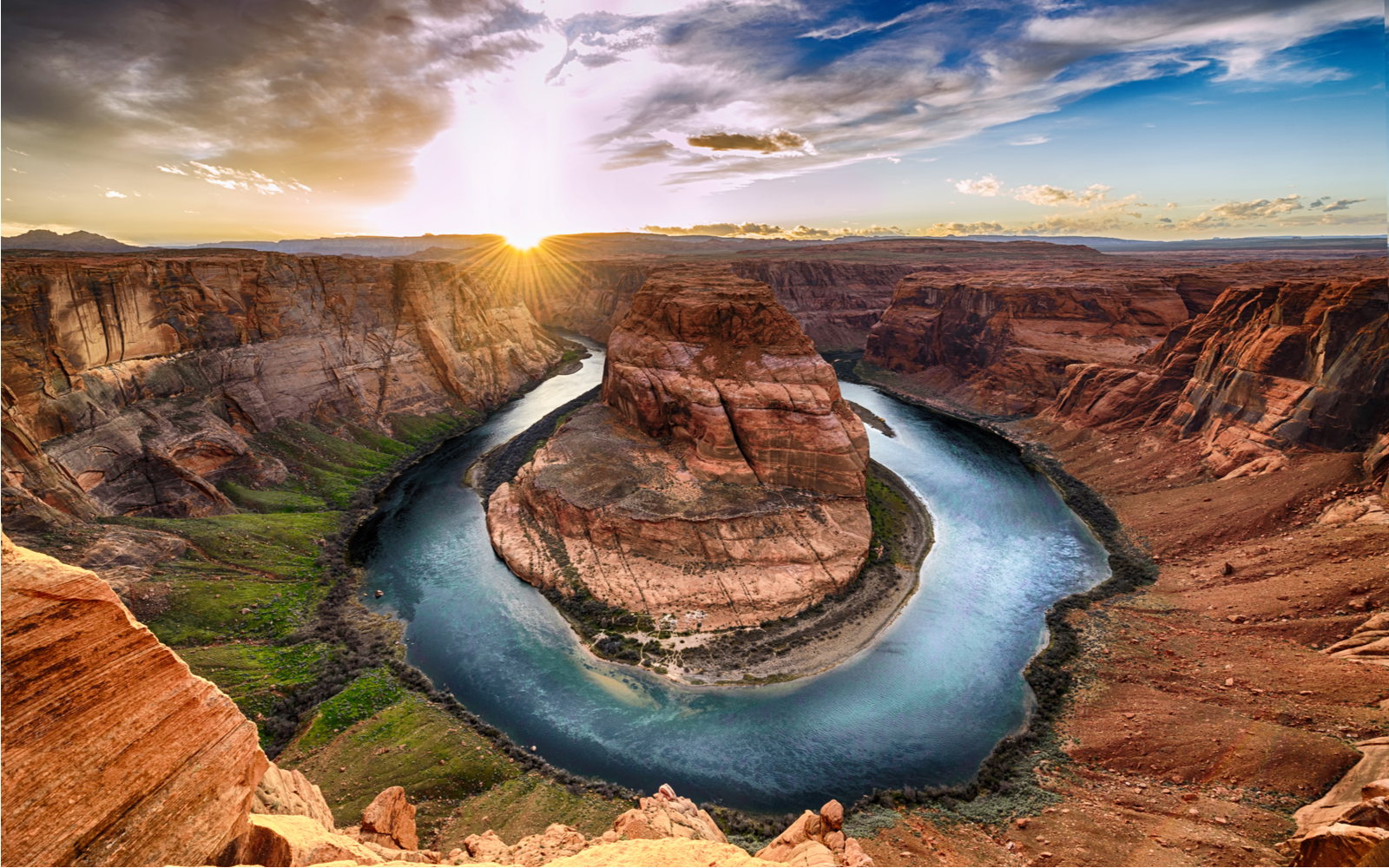 Horseshoe Bend pictured during the best time to visit the Grand Canyon with the sun setting on the day
